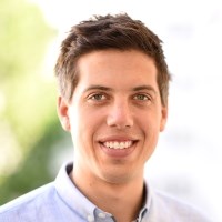 Head shot of a businessman wearing a pale shirt