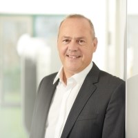 Business man in a black suit and white shirt