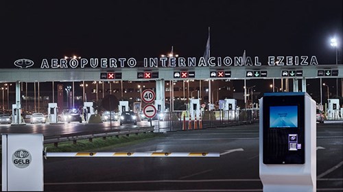 Entrance to the airport parking lot in the dark