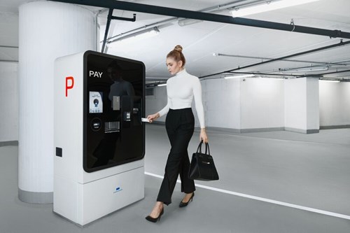 Woman paying for parking