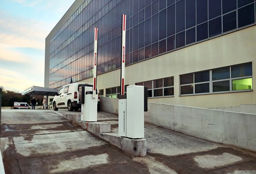 Parking barriers up at the entrance to the parking lot