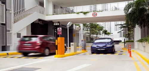 Cars Entering and exiting a barrierless parking facility.