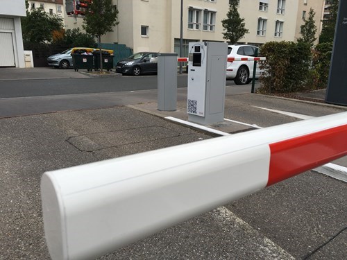 Red and white barrier of a parking facility