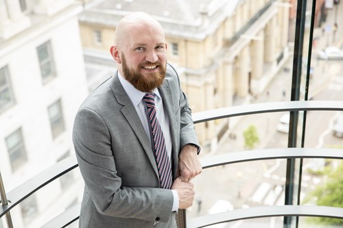 Head and shoulder shot of Mark Pegler, CEO of Park Cloud in a suit