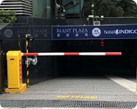 Red and white barrier at entrance to underground car park