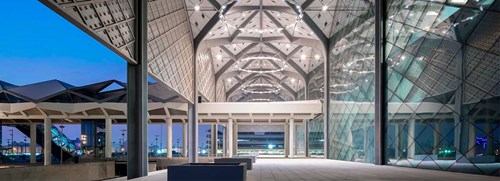 Railway station made of glass at night