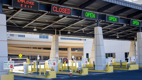 Signage above entrance saying Closed or Open