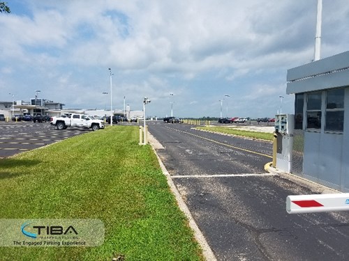 Parking barrier at an airport parking lot with kiosk