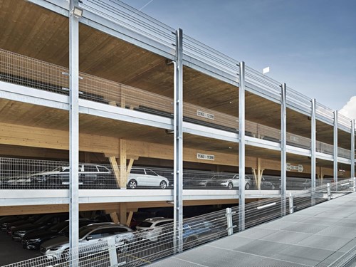 Fall protection shown on ramp of wooden parking garage